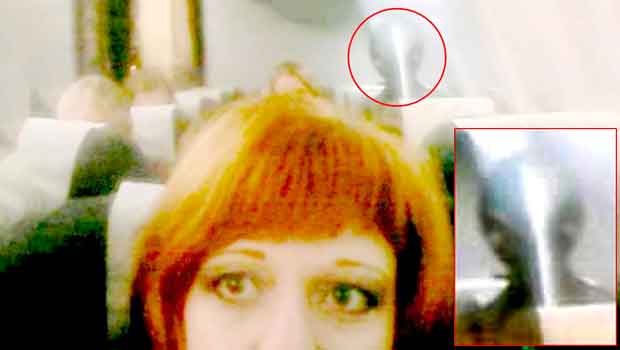 Woman Captures Photo of Alien in Airplane Selfie