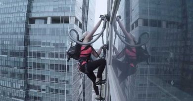 Climber Scales Skyscraper Using Two Cordless Vacuums